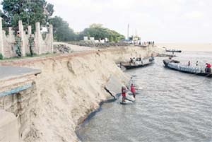 Jamuna devours part of Sirajganj town protection embankment
