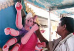 Artisans prepare for Durga Puja in Pabna